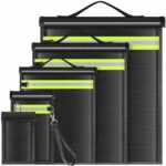 A set of four black and yellow faraday bags with a keychain.